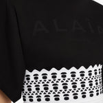 alaia-vienne-stretch-knit-corset-belt-black-and-white-amarees