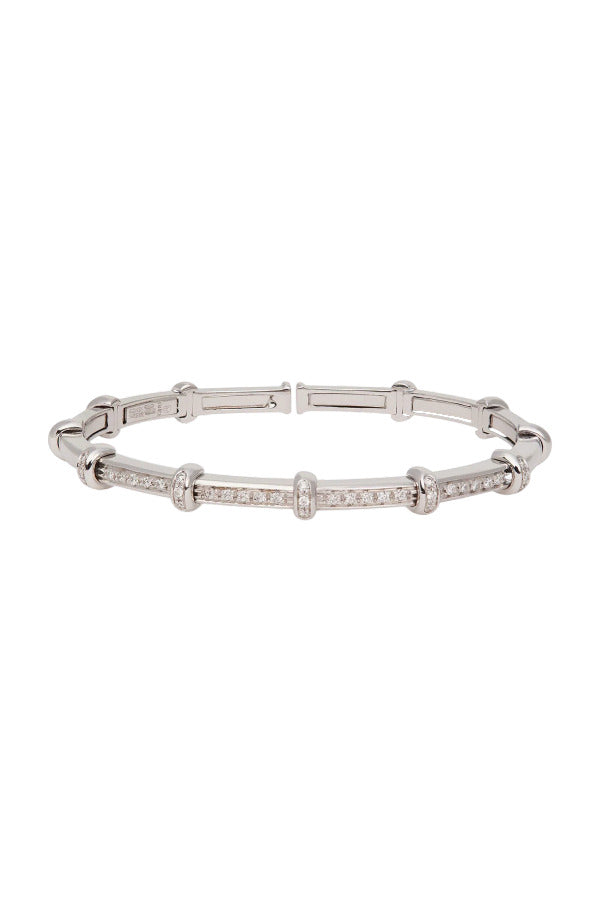 Front view of 18k white gold spring bracelet on white background with no model shown.