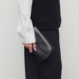 The Row Curved Clutch in Matte Box Calf