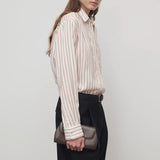 The Row Curved Clutch in Matte Box Calf