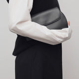 The Row Curved Clutch in Matte Box Calf