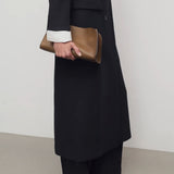 The Row Peggy Clutch in Saddle Leather