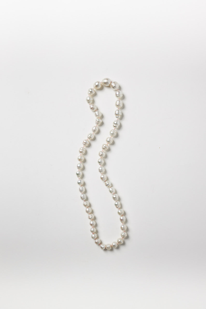 White Baroque Pearl Strand on Pink String