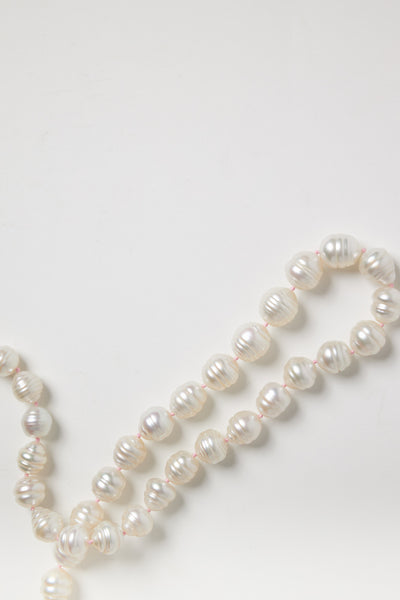 White Baroque Pearl Strand on Pink String