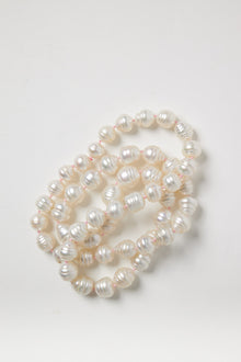 White Baroque Pearl Strand on Pink String