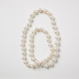 White Baroque Pearl Strand on Pink String