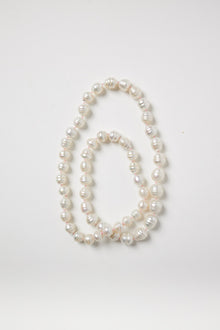 White Baroque Pearl Strand on Pink String