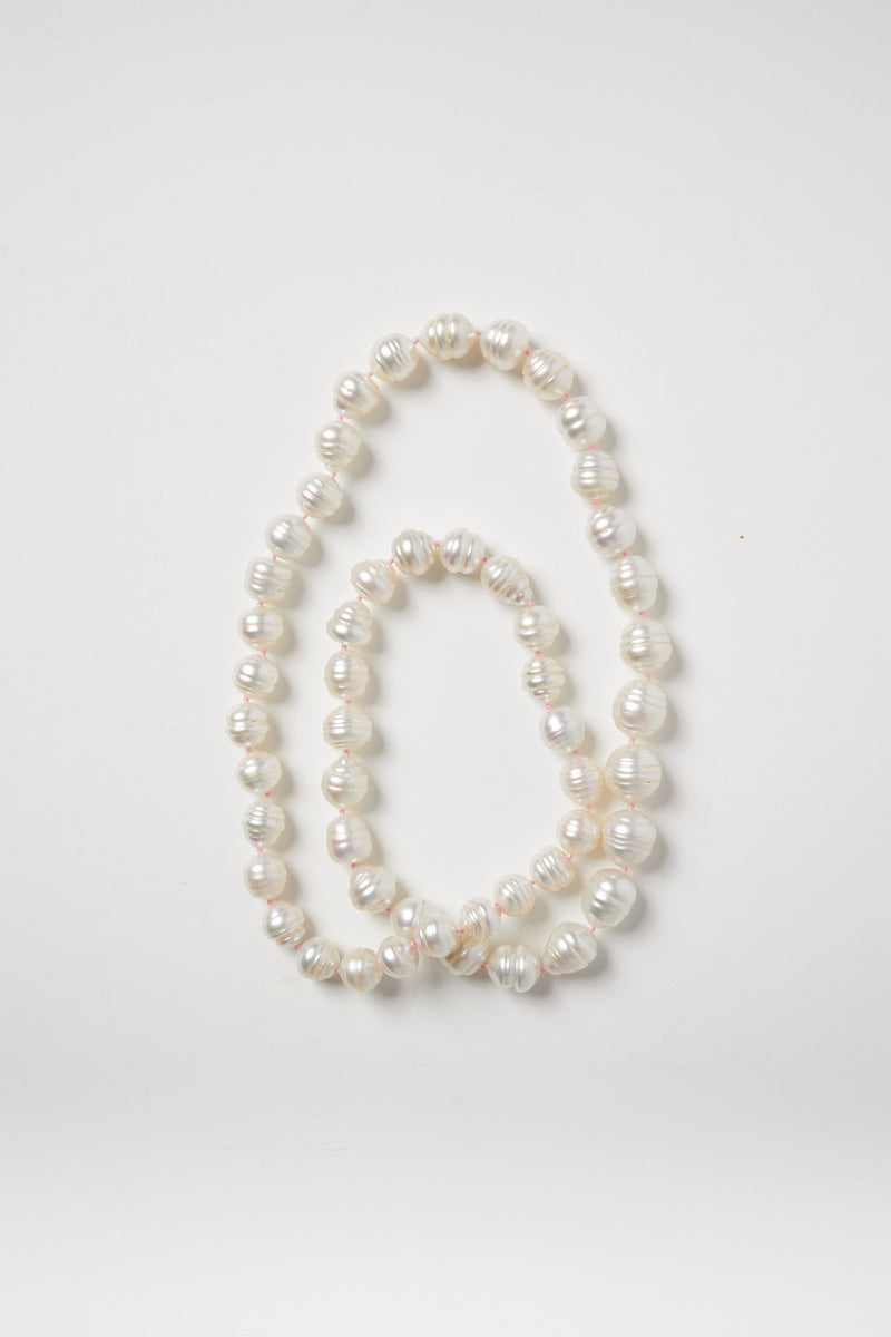 White Baroque Pearl Strand on Pink String