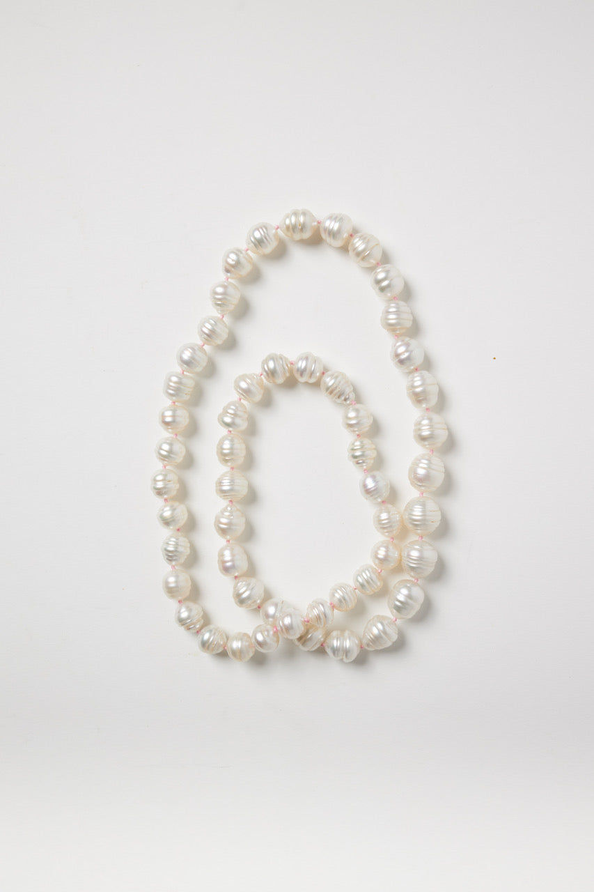 White Baroque Pearl Strand on Pink String