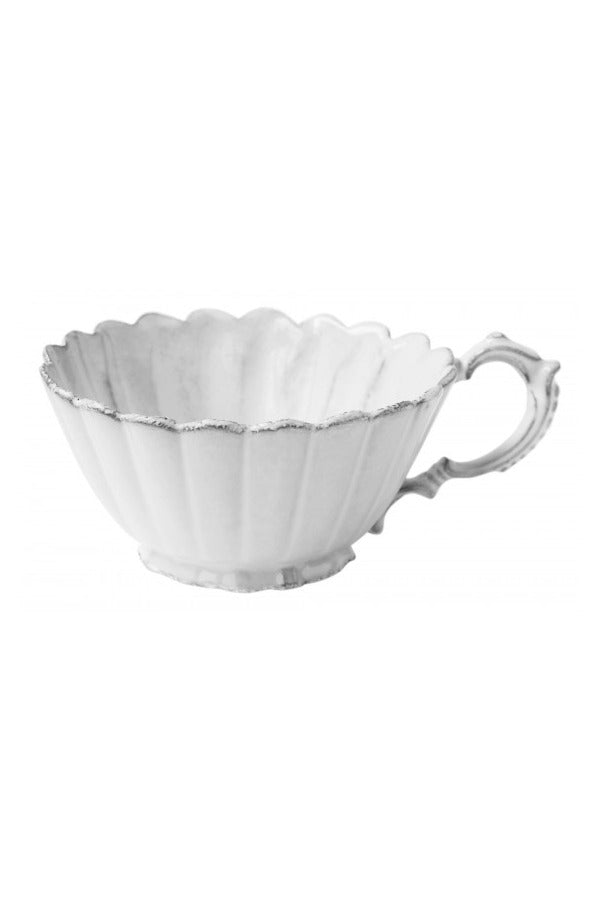 Front view of marguerite tea cup on white background, with no model shown.