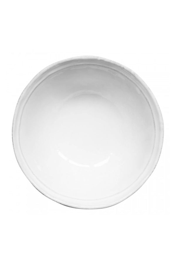 Overhead view of medium simple soup plate on white background, with no model shown.