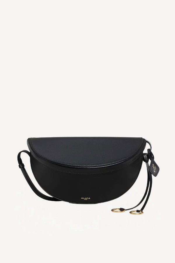 Front view of noir hip east west bag on white background, with no model shown.