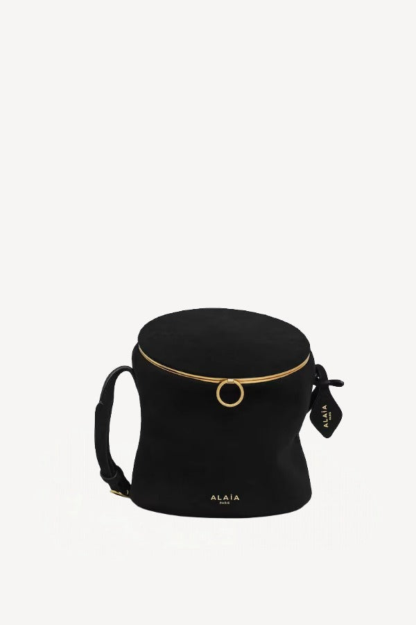 Front view of noir la canette small bag on white background, with no model shown.