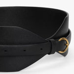 Side closeup view of black large belt on white background, with no model shown.