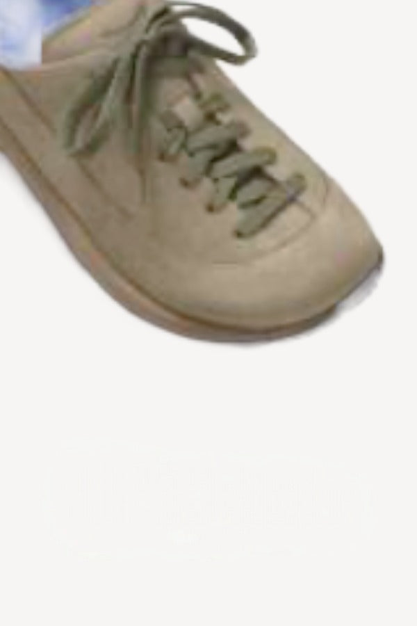 Left side overview of taupr uerzell sneaker on white background, with no model
