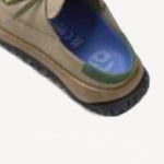 Leftside overview of uerzell sneaker on white background, with no model shown.