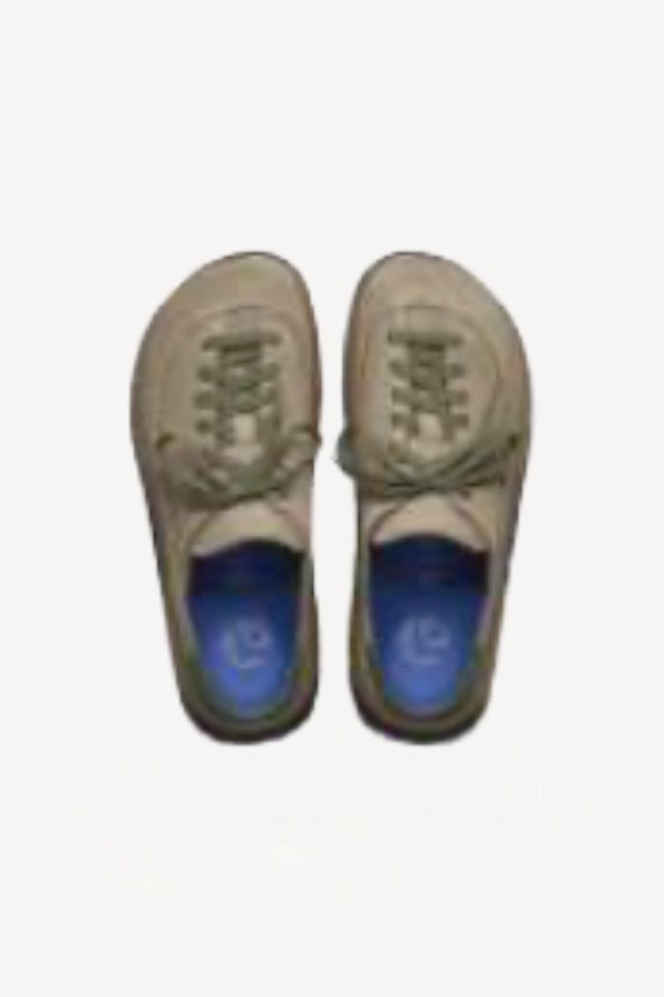 Overhead view of taupe uerzell sneaker on white background, with no model shown.