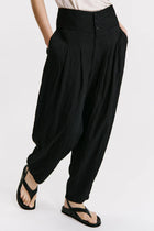Wide-fitting trousers with high basque in viscose embossed effect