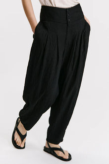 Wide-fitting trousers with high basque in viscose embossed effect