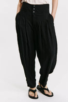 Wide-fitting trousers with high basque in viscose embossed effect
