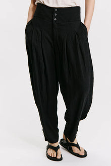 Wide-fitting trousers with high basque in viscose embossed effect