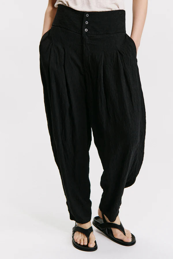Wide-fitting trousers with high basque in viscose embossed effect