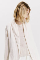Double layered over jacket in silk blend with shawl collar and rounded bottom