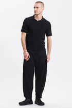 Loose-fit short-sleeved polo shirt in cotton crepe links knit