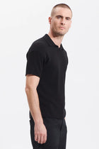 Loose-fit short-sleeved polo shirt in cotton crepe links knit