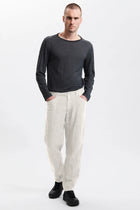 Loose fit linen trousers with front carter pockets