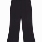 Front view of cropped flared pants on flat surface, with no model shown, against a white background.