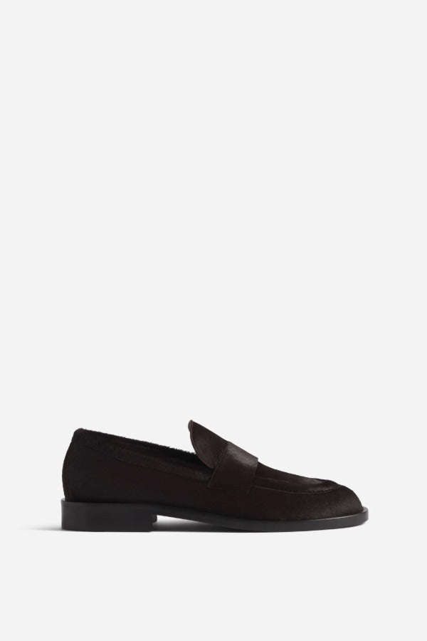 Right side view of chocolate calf hair loafer on white background, with no model shown.