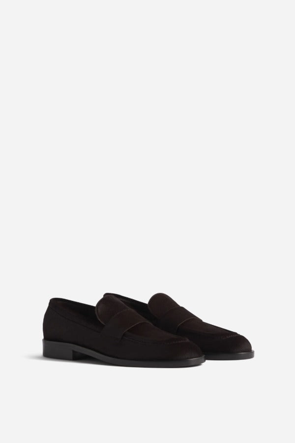 Pair view of chocolate calf hair loafer on white background, with no model shown.