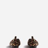 Back view of leopard pointed elasticized slipper on white background, with no model shown.