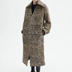 Front view of leopard coat on model wearing black top and flats, against a white background.