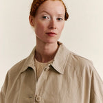 Front closeup view of oatmeal tatiana jacket on model, against a white background.