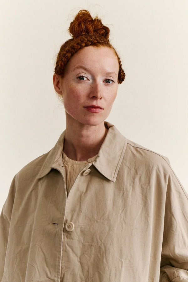 Front closeup view of oatmeal tatiana jacket on model, against a white background.