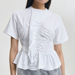 Front closeup view of white ace t-shirt on model, against a white background
