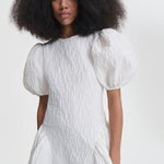 Front closeup view of bali dress on model, against a white background.