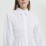 Front closeup view of braxton shirt on model against a white background.