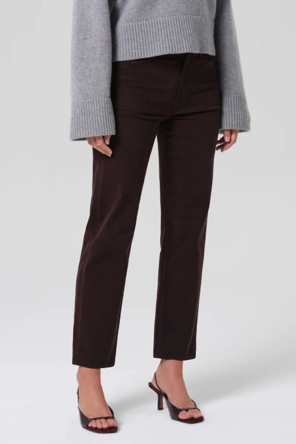 Alternate front view of barrister caia pants on model wearing grey sweater and heels, against a white background.