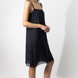 Side view of midnight dosa slip on model, against a white background.