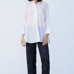 Front view of rice little subhash shirt on model wearing midnight pants and natural sandals against a white background.