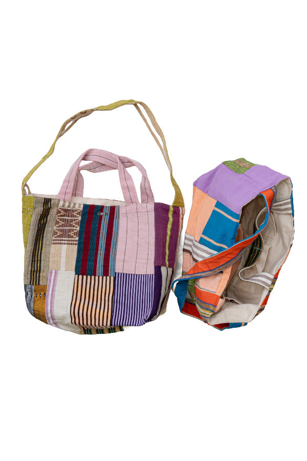 Front and overhead view of multicolor dosa luna bag on white background, with no model shown.