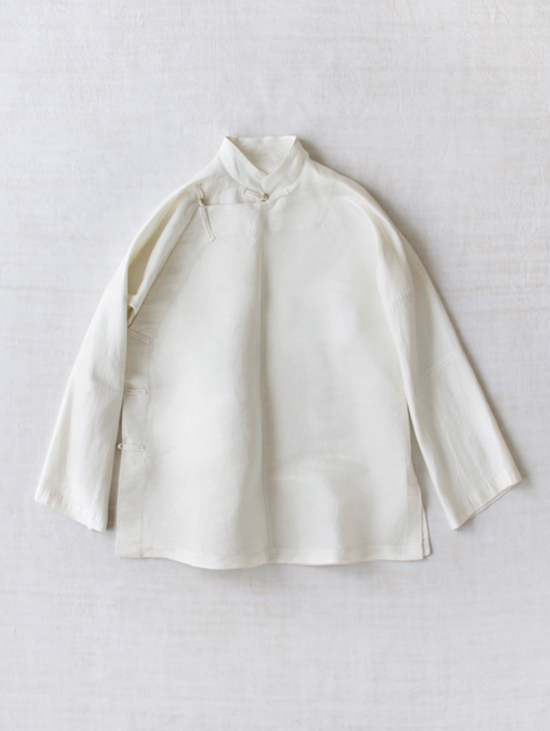 Front view of rice mandarin jacket on white background, with no model shown.