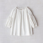 Front view of rice mary ellen mark blouse on white background, with no model shown.