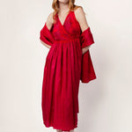 Front view of lipstick rajasthani dress with lipstick shawl and red sandals, against a white background.