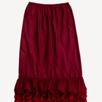 Front view of tibet ruffle skirt on white background, with no model shown