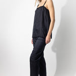 Side view of midnight short chemise on model wearing natural sandals, against a white background.