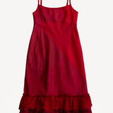 Front view of lipstick slip with ruffles on white background, with no model shown.